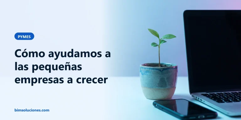 Brote de planta que crece junto a una laptop en el escritorio de un pequeño taller, símbolo del crecimiento de una pyme